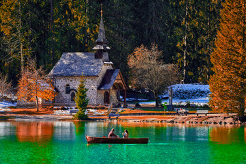 The beautiful Braies lake in late autumn with a little snow, Pearl of the Dolomite lakes is an UNESCO heritage and is located in the Braies Alto Adige,Italy