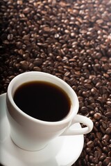 Cup of coffee and coffee beans