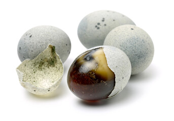 preserved duck eggs on white background