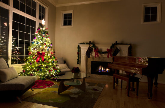 The glow of Christmas spirit in living room of home during a dark night