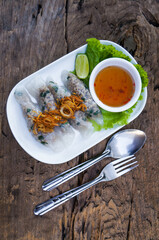Vietnamese Food banh Cuon and Salad Meat and Vegetable and Banh xeo Vietnamese Pho on the wooden table