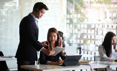 Business people in the office are planning a strategy for the future of the business.	