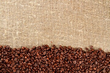 Coffee Beans Stacked on Canvas Sack