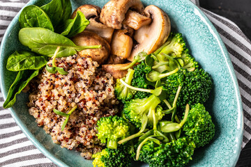 Buddha bowl. Raw vegetables with mushrooms and broccoli and quinoa. superfood concept. Clean healthy detox eating. Vegan vegetarian food. Top view