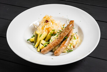 mashed potato with sausage and cabbage salad
