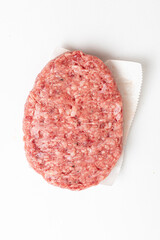  Raw minced homemade cutlets, on the white background