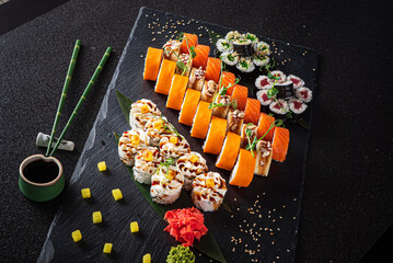sushi on the black background
