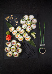 sushi on the black background