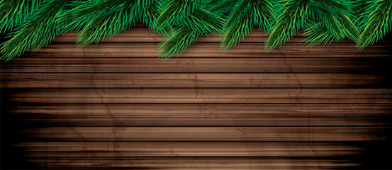 Naklejka premium Fir Branches on Wooden Background. Pine Sprigs on Above. Christmas and New Year Decoration.