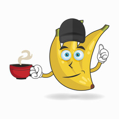 Banana mascot character holding a hot cup of coffee. vector illustration