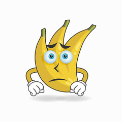 Banana mascot character with sad expression. vector illustration