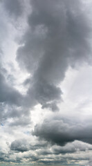 Fantastic thunderclouds, vertical panorama
