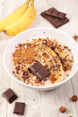 banana, chocolate and nuts with porridge