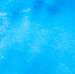 Blue paint on the snow in winter.
