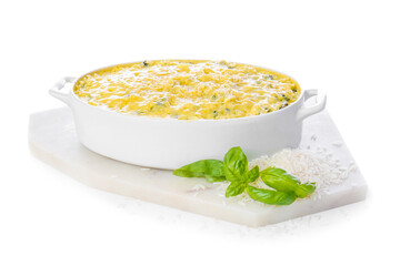 Baking dish with tasty rice casserole on white background