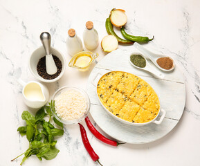 Baking dish with tasty rice casserole on table