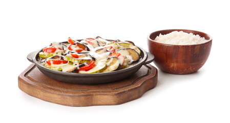 Baking dish with tasty rice casserole on white background