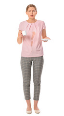 Stressed young woman with coffee stains on her shirt on white background