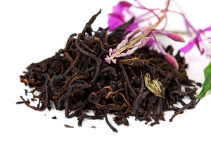 Blooming Chamerion angustifolium (common names: fireweed, great willowherb, rosebay willowherb) flower on a heap of herbal tea isolated on a white background.