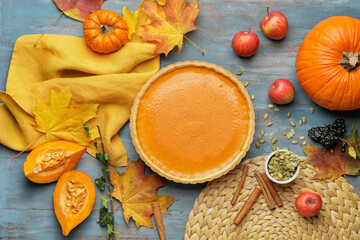 Composition with tasty pumpkin pie on wooden background