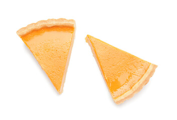 Slices of tasty pumpkin pie on white background