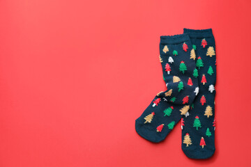 Warm socks on color background