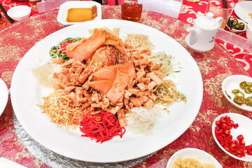 Yusheng or yee sang is traditional customary food consumed during Chinese New Year for luck and...