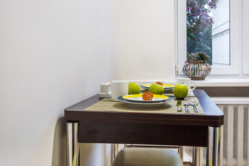 served table in interior of modern luxure guest room in studio apartments in minimalistic style