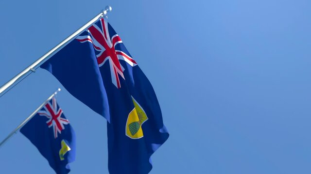 The national flag of Turks and Caicos Islands flutters in the wind