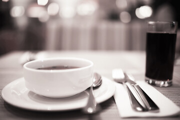 cutlery on the table in a restaurant table setting, knife, fork, spoon, interior