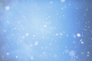 The snowfall in the sky with clouds, beautiful by nature.