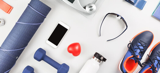 Sports banner. Healthy lifestyle blue and red gender neutral sports accessories knolling flat lay...