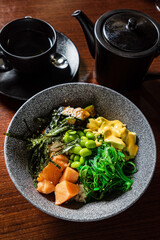 buddha bowl with fish and seaweed