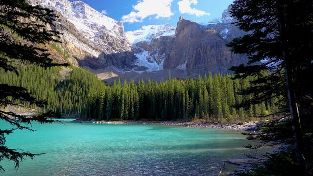 Moraine lake beautiful landscape in summer to early autumn sunny day morning. Sparkle turquoise blue water, snow-covered Valley of the Ten Peaks. Banff National Park, Canadian Rockies, Alberta, Canada