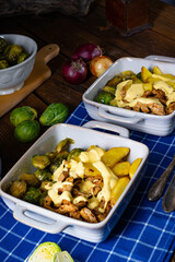 Gratinated Zurich ragout with Brussels sprouts, potatoes and Bearnaise sauce