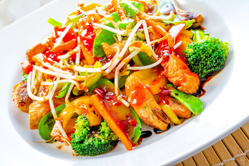 sweet and sour chicken with rice and vegetables
