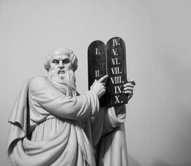 jewish Jehovah Statue of God with a book in their hands against on a white background. Biblical Ten...