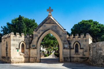 Fototapeta na wymiar The main gate to the Capuccini Naval Cemetery also known as Kalkara Naval Cemetery in Kalkara, Malta.