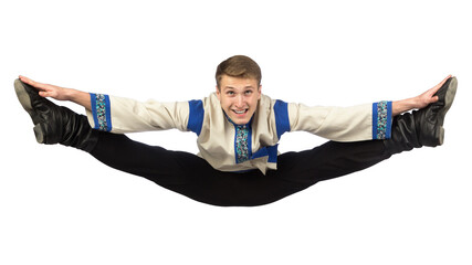 Attractive guy jumping russian in folk costume isolated on white