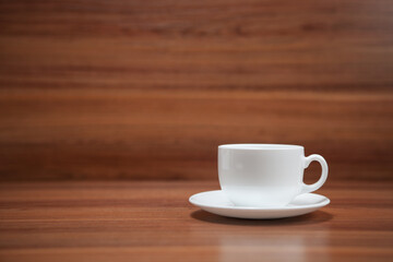 Coffee cup top view on wooden table background