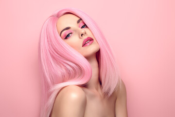 Beauty Fashion woman with Colorful Pink Dyed Hair. Girl with blue eyes, perfect Makeup and Hairstyle. Beautiful smiling model portrait, fashionable pink make up, hair. Skincare concept