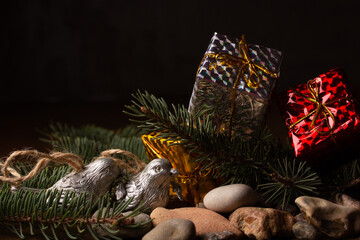 Christmas accessories. Birds, boxes, branches of a Christmas tree