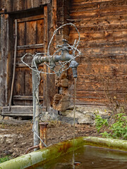 The fountain in front of the cowshed 