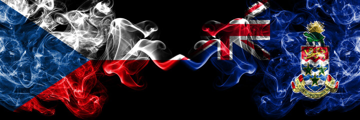 Czech Republic, Czech vs British, Britain, Cayman Islands smoky mystic flags placed side by side. Thick colored silky abstract smoke flags.