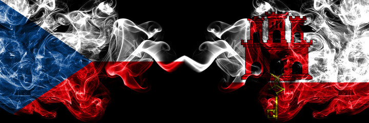 Czech Republic, Czech vs British, Britain, Gibraltar smoky mystic flags placed side by side. Thick colored silky abstract smoke flags.