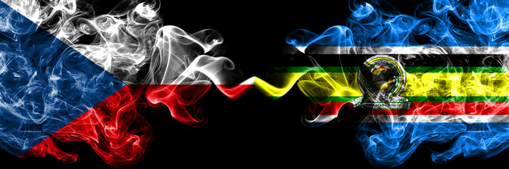 Czech Republic, Czech vs East African Community smoky mystic flags placed side by side. Thick colored silky abstract smoke flags.