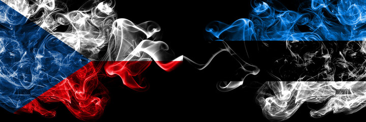 Czech Republic, Czech vs Estonia, Estonian smoky mystic flags placed side by side. Thick colored silky abstract smoke flags.