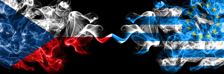 Czech Republic, Czech vs Federal Republic of Southern Cameroons smoky mystic flags placed side by side. Thick colored silky abstract smoke flags.