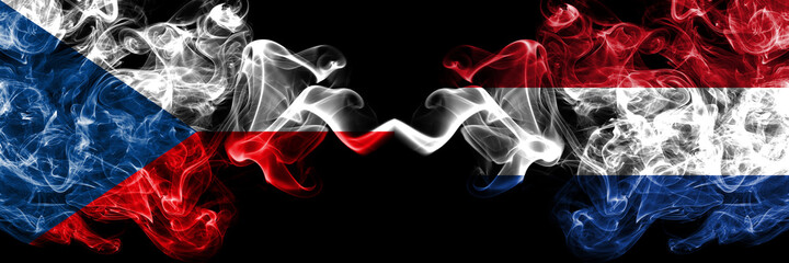 Czech Republic, Czech vs Netherlands, Dutch, Holland smoky mystic flags placed side by side. Thick colored silky abstract smoke flags.