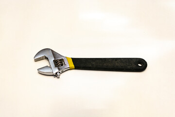 A manual tool for repair. adjustable wrench